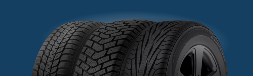 Close-up on a row of three tires